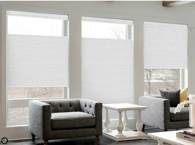 Top down bottom up cellular shades in a bedroom — blackout privacy at night, soft natural light in the morning