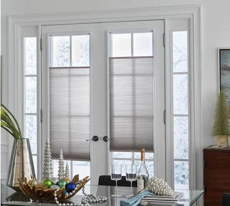 TDBU cellular shades on sliding glass door — top open for natural light, bottom closed for privacy