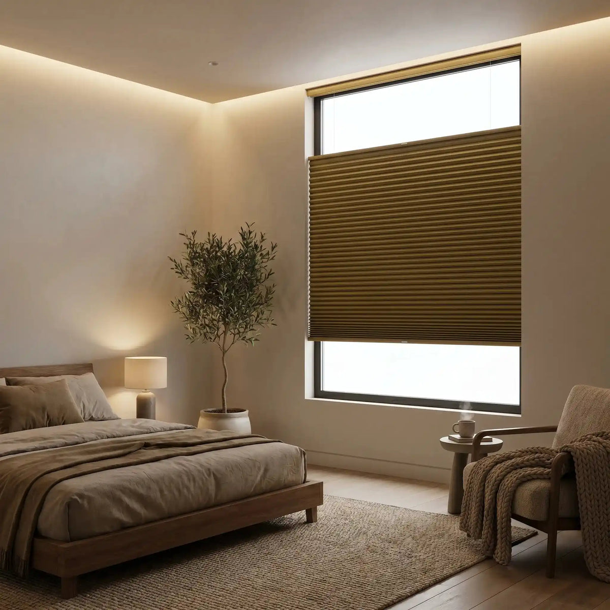 Top-down bottom-up honeycomb cellular shades in a modern bedroom, open at top for natural light and closed at bottom for privacy