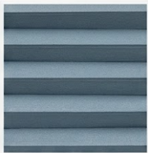Close-up of cordless double cell honeycomb cellular shades in light blue-gray, showing the pleated fabric texture and air pocket structure