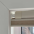 Close up of no drill honeycomb shade tension headrail corner with soft silicone foot pad and hex lock nut

